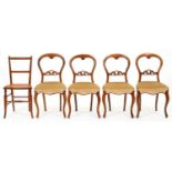A set of four Victorian walnut chairs balloon back dining chairs and a bedroom chair with caned seat