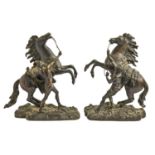 A pair of bronze sculptures of the Marly horses, early 20th c, after Guillaume Coustou, even dark