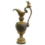 A French bronze Bacchanalian ewer of unusually large size, late 19th c, the up-scrolled handle set