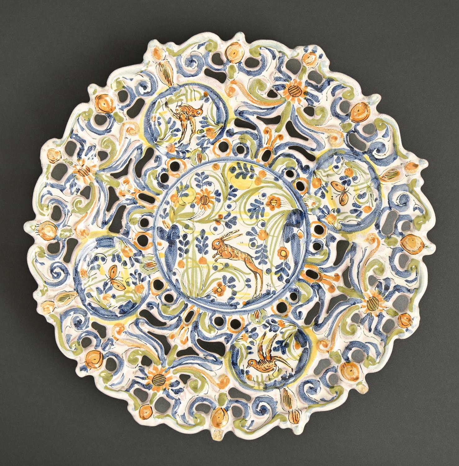 Italian maiolica. A pierced polychrome footed dish, probably Ligurian, possibly Savona, 18th c,