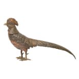 A cold painted Vienna bronze sculpture of a golden pheasant, early 20th c, 33cm l Paint dirty and