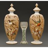 A pair of enamelled white glass vases and stoppers, c1880, with a bird on a branch, 28cm h and a