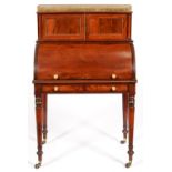 A George IV brass mounted mahogany cylinder bureau, W Priest London, the galleried superstructure