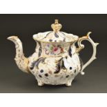 A Rockingham teapot and cover, c1830-42, of three spur handle shape, in a cobalt and gilt set