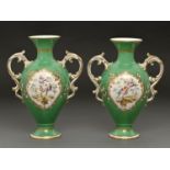 A pair of Coalport apple green ground vases, c1860, with gilt rococo handles, painted with exotic