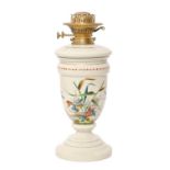 An enamelled opaque glass oil lamp and fount, late 19th c, with bird and insects in a watery