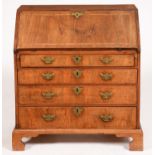 A George II walnut and featherbanded bureau, fitted interior, 96cm h; 46 x 84cm Old replacement