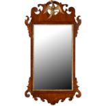 A Victorian parcel gilt walnut fretted frame mirror, 83cm h Some faults and repair
