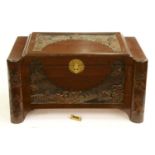 A Chinese carved camphor wood chest, circa mid 20th c, 56cm h; 50 x 100cm The dark stain original;