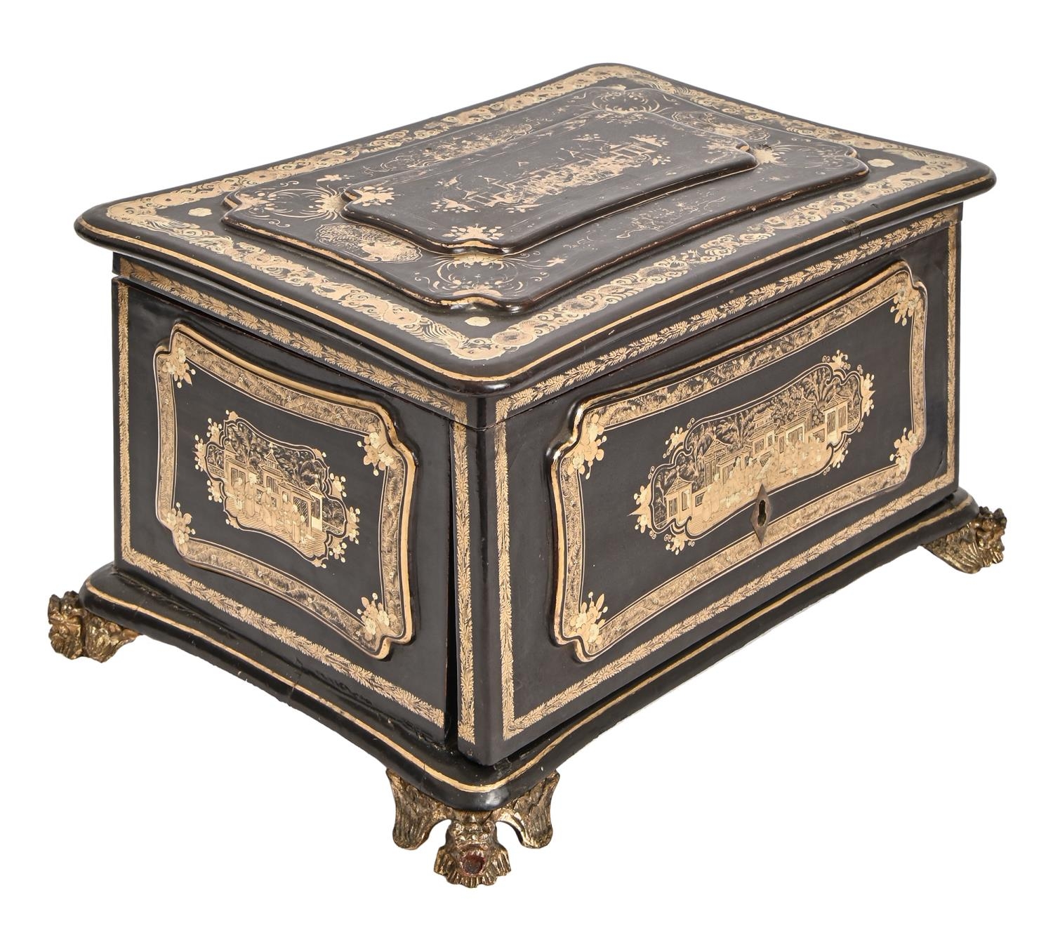 A Chinese export black and gold lacquer table cabinet, 19th c, with fitted interior, containing