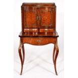 A French kingwood, tulipwood and cube parquetry bonheur du jour, late 19th c, in Louis XV style,