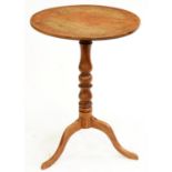 A fruitwood tripod table, 19th c, 67cm h; 50cm diam Top faded with ring marks, legs repaired