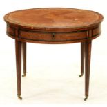 An Italian walnut and marquetry centre table, early 19th c, decorated in neo classical style with