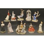 A Royal Worcester group of the Tea Party and eight Royal Worcester figures of young women from the