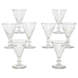 A set of eight wine glasses, late 19th / early 20th c, with faceted conical bowl, 13cm h One
