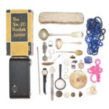 A silver clothes brush, a Stratton compact and costume jewellery, including a silver watch fob