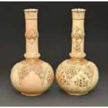 A pair of Grainger's Worcester reticulated vases, 1899, decorated in raised gilding with foliage