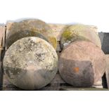 Four English sandstone staddle stone ‘mushrooms’ or caps, 19th c, one dressed, 48-57cm diam