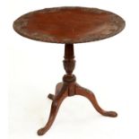 A Victorian carved and stained wood tripod table, 70cm h; 71cm diam Top scratched