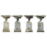 A set of four reconstituted stone garden vases and pedestals, mid 20th c, 117cm h Some damage