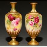 A pair of Royal Worcester vases, 1918, painted by J Flexman, one signed, with Hadley roses, 19cm