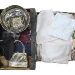 A quantity of Victorian and later table linen, beadwork and crocodile skin handbags and a silver