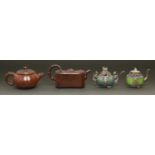 Two Chinese Yixing stoneware tea pots and covers and a Chinese metal and enamel mounted green