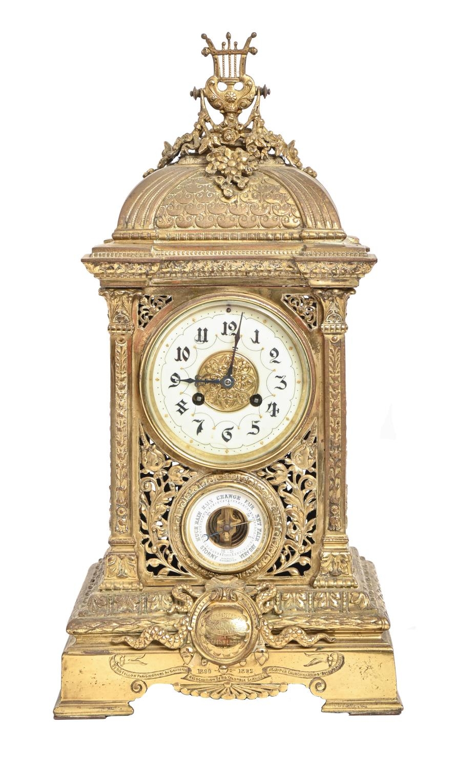 A French cast brass mantel clock, late 19th c, with aneroid barometer and primrose enamel dial, in