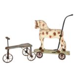 A painted pine child’s push along horse and contemporary tricycle, late 19th or early 20th c,