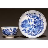 A Worcester tea bowl and saucer, c1780, transfer printed in underglaze blue with the Fence