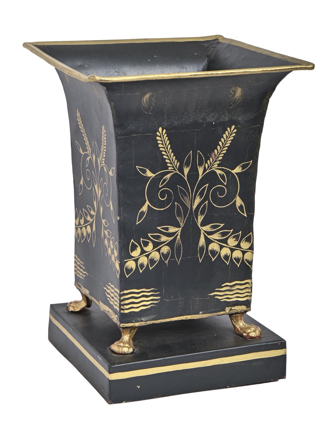 A black and gilt tole jardiniere, in French Empire style, 36cm h Minor dents and wear