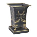 A black and gilt tole jardiniere, in French Empire style, 36cm h Minor dents and wear