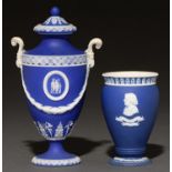 A Wedgwood blue jasper dip vase and cover, late 19th c, of shield shape with ram's head handles,