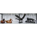 A pair of hand painted wooden decoy ducks, a mixed metal sculpture of a swan in flight, 34cm w and a