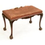 A walnut stool, early 20th c, on carved cabriole legs and claw and ball feet, 52cm h; 45 x 81cm Legs