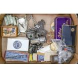 A Joseph Lucas cycle lamp, miscellaneous military and other badges and buttons, cigarette