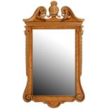A giltwood, composition and walnut framed mirror, with bevelled plate, in George III style, 105cm h;