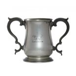 An English baluster pewter loving cup, 1836-63, finely engraved with Talbot crest, glass bottom,