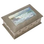 Liberty & Co. A pewter box, c1900, the domed lid with a painted enamel of waves breaking on a