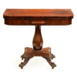 An early Victorian mahogany card table, with octagonal baluster pillar, platform and carved paw
