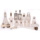 Miscellaneous Edwardian and early 20th c silver mounted cut glass scent bottles and jars, and