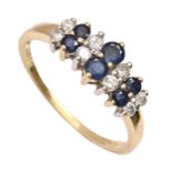 A sapphire and diamond ring, in 18ct gold, marked 0.25 ct, London, no date letter, 3.1g, size Q Good