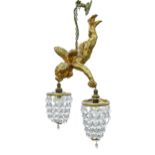 A gilt flying cherub figural hanging light, with faceted glass beads, figure 33cm h Minor scratch;