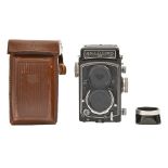 A Rolleicord Va twin lens reflex camera, No 1928746, with Xenar F3.5 75mm taking lens, leather