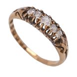 A five stone diamond ring, with old cut diamonds, in 18ct gold, London 1913, 3.5g, size O Good