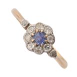 A sapphire and diamond cluster ring, in gold, marked 18ct, 1.9g, size N Slight wear