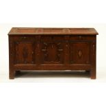 A George III panelled oak blanket box, 66cm h; 124 x 55cm Panelled lid with shrinkage crack, minor