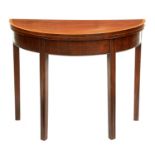 A George III mahogany tea table, the crossbanded top on moulded legs, 72.5cm h; 45 x 91cm Light re-