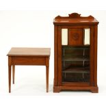 An Edwardian mahogany music cabinet, 86cm h; 53cm l and a walnut music stool, adapted as a table (2)