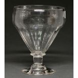 An English glass rummer, early 19th c, the panel moulded bowl on short straight stem with collars